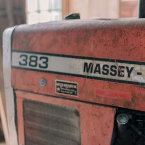 a close up of a red machine in a room